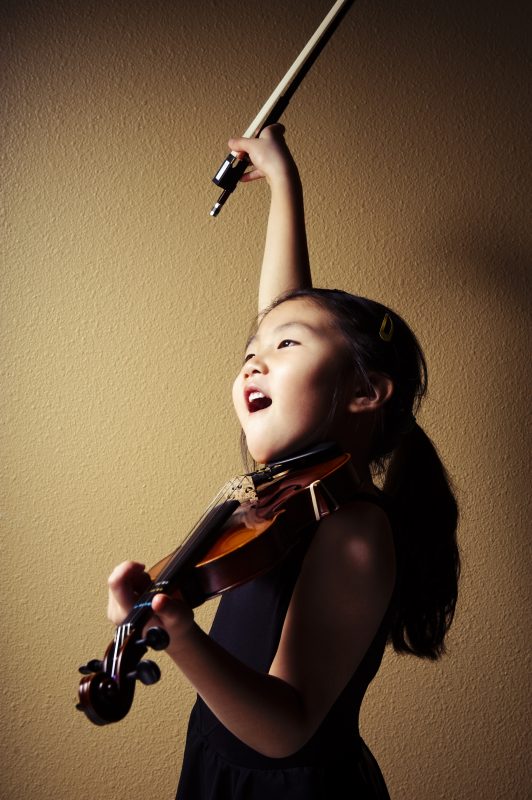 Young Asian Girl Playing Violin